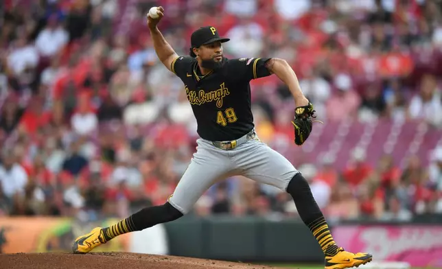 Pittsburgh Pirates' Yohan Ramírez pitches during the first inning of a baseball game against the Cincinnati Reds on Thursday, July 30, 2026 in Cincinnati. (AP Photo/Tanner Pearson)