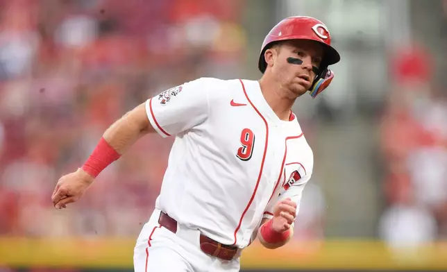 Cincinnati Reds' Matt McLain rounds the bases after a double by Elly De La Cruz during the third inning of a baseball game against the Pittsburgh Pirates on Thursday, July 30, 2026 in Cincinnati. (AP Photo/Tanner Pearson)