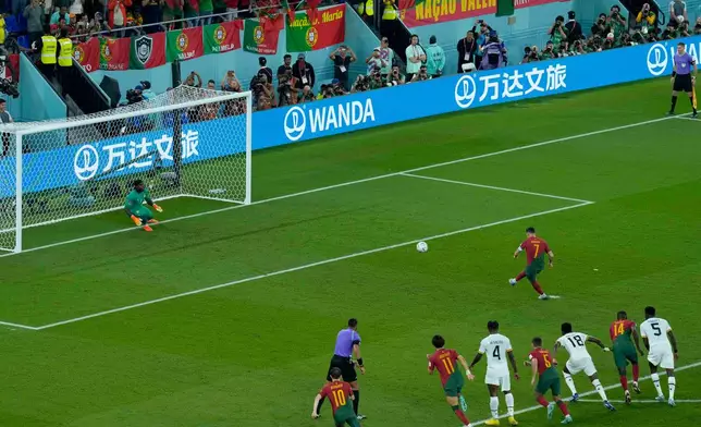 FILE - Portugal's Cristiano Ronaldo scores from the penalty spot during the World Cup group H soccer match against Ghana in Doha, Qatar, Nov. 24, 2022. (AP Photo/Francisco Seco, File)