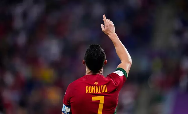 FILE - Portugal's Cristiano Ronaldo celebrates after scoring from the penalty spot his side's opening goal against Ghana during a World Cup group H soccer match in Doha, Qatar, Thursday, Nov. 24, 2022. (AP Photo/Manu Fernandez)