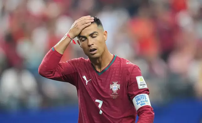 Portugal's Cristiano Ronaldo (7) reacts during the World Cup round of 16 soccer match between Portugal and Spain in Arlington, Texas, near Dallas, Monday, July 6, 2026. (AP Photo/Julio Cortez)