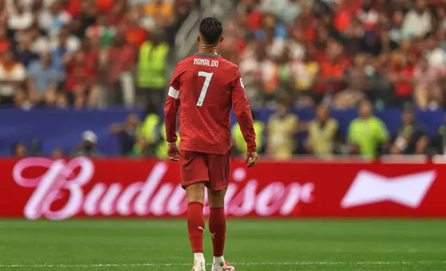 Portugal's Cristiano Ronaldo (7) stands during the World Cup round of 16 soccer match between Portugal and Spain in Arlington, Texas, near Dallas, Monday, July 6, 2026. (AP Photo/Gareth Patterson)