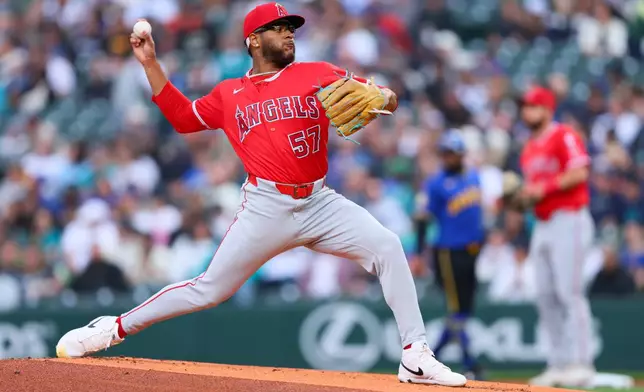 Los Angeles Angels pitcher Walbert Ureña delivers in the first inning of a baseball game against the Los Angeles Angels, Thursday, July 2, 2026, in Seattle. (AP Photo/Kevin Ng)
