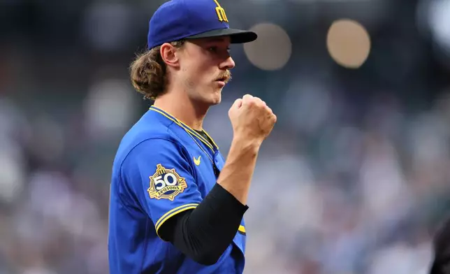 Seattle Mariners pitcher Bryce Miller reacts after the third inning of a baseball game against the Los Angeles Angels, Thursday, July 2, 2026, in Seattle. (AP Photo/Kevin Ng)
