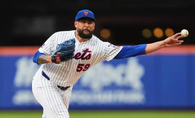 New York Mets' Sean Manaea pitches during the second inning of a baseball game against the Los Angeles Dodgers Friday, July 24, 2026, in New York. (AP Photo/Frank Franklin II)