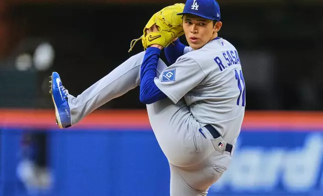 Los Angeles Dodgers' Roki Sasaki pitches during the second inning of a baseball game against the New York Mets Friday, July 24, 2026, in New York. (AP Photo/Frank Franklin II)