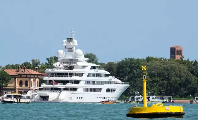 U.S. Ambassador Tilman Fertitta's superyacht 'Boardwall' is docked as part of "Freedom 250 Coastal Diplomacy" tour, as protest by activists is expected this afternoon, in Venice, Friday, July 17, 2026. (AP Photo/Luca Bruno)