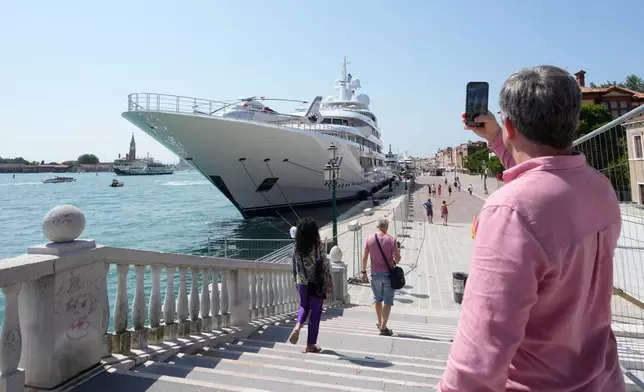 U.S. Ambassador Tilman Fertitta's superyacht 'Boardwall' is docked as part of "Freedom 250 Coastal Diplomacy" tour, as protest by activists is expected this afternoon, in Venice, Friday, July 17, 2026. (AP Photo/Luca Bruno)