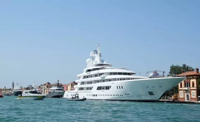 U.S. Ambassador Tilman Fertitta's superyacht 'Boardwall' is docked as part of "Freedom 250 Coastal Diplomacy" tour, as protest by activists is expected this afternoon, in Venice, Friday, July 17, 2026. (AP Photo/Luca Bruno)