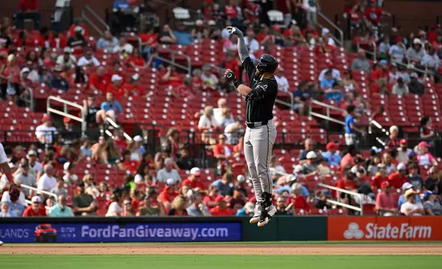 Arizona Diamondbacks' Tyler Locklear celebrates after hitting a two-run home run in the fourth inning of a baseball game against the St. Louis Cardinals, Thursday, July 23, 2026, in St. Louis. (AP Photo/Joe Puetz)