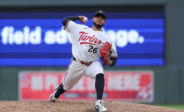 Minnesota Twins starting pitcher Taj Bradley delivers during the fourth inning of a baseball game against the Cleveland Guardians, Tuesday, July 7, 2026, in Minneapolis. (AP Photo/Bailey Hillesheim)