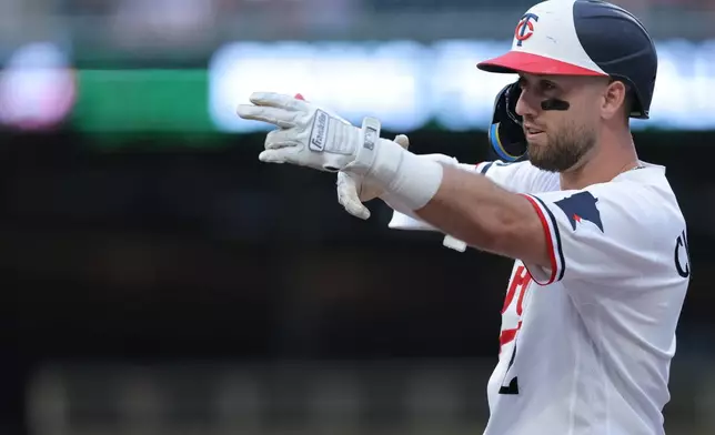 Minnesota Twins' Kody Clemens celebrates hitting a single during the fifth inning of a baseball game against the Cleveland Guardians, Tuesday, July 7, 2026, in Minneapolis. (AP Photo/Bailey Hillesheim)