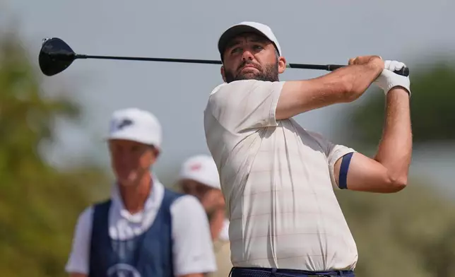 Scottie Scheffler of the United Statesplays off the 2nd tee during the final day of the British Open Golf championships at Royal Birkdale golf club, in Southport, England, Sunday, July 19, 2026. (AP Photo/David Goldman)
