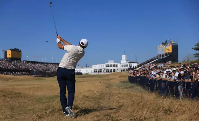 Scottie Scheffler of the United States plays to the 18th green during the final day of the British Open Golf championships at Royal Birkdale golf club, in Southport, England, Sunday, July 19, 2026. (AP Photo/Peter Morrison)