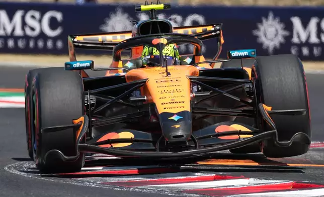 McLaren driver Lando Norris of Britain steers his car during the third free practice ahead of Sunday's Formula One Hungarian Grand Prix auto race, at the Hungaroring racetrack in Mogyorod, near Budapest, Hungary, Saturday, July 25, 2026. (AP Photo/Darko Vojinovic)