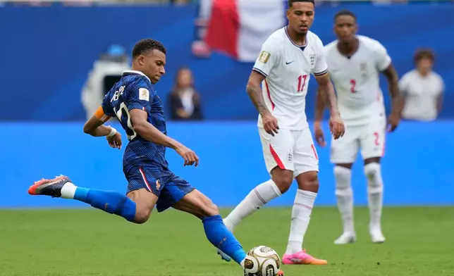 France's Kylian Mbappe (10) kicks the ball during the World Cup third-place playoff soccer match between France and England in Miami Gardens, Fla., Saturday, July 18, 2026. (AP Photo/Lynne Sladky)