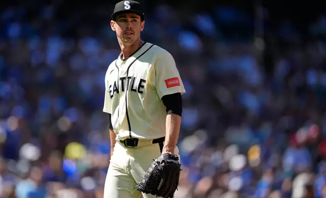 Seattle Mariners starting pitcher Emerson Hancock walks back to the dugout after the seventh inning against the Toronto Blue Jays during a baseball game, Sunday, July 5, 2026, in Seattle. (AP Photo/Lindsey Wasson)