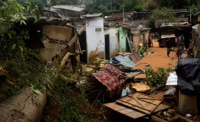 Houses damaged by landslides in an informal settlement of Attecoube, in Abidjan, Ivory Coast, Tuesday, June 30, 2026. (AP/Photo Diomande Ble Blonde)