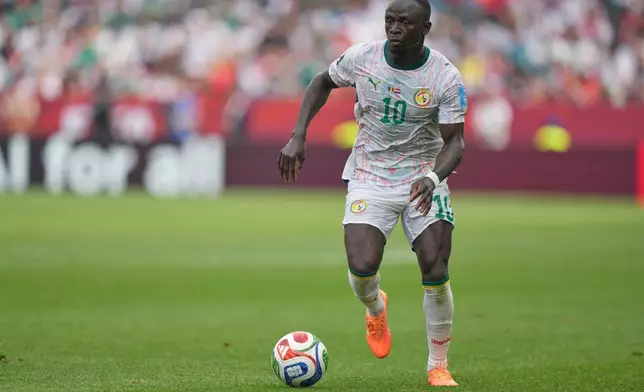 Senegal's Sadio Mane (10) plays during the World Cup Group I soccer match between Senegal and Iraq in Toronto, Friday, June 26, 2026. (AP Photo/Stephanie Scarbrough)
