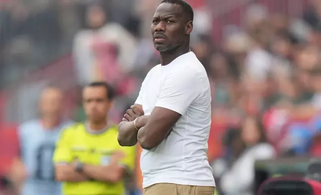 Senegal head coach Pape Thiaw looks onto the pitch during the World Cup Group I soccer match between Senegal and Iraq in Toronto, Friday, June 26, 2026. (AP Photo/Stephanie Scarbrough)