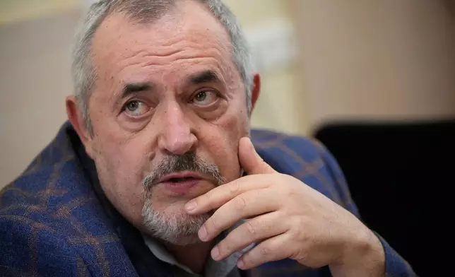 Russian politician Boris Nadezhdin, accused of displaying "extremist symbols," attends a court session in the town of Dolgoprudny outside Moscow, Russia, Friday, July 17, 2026. (AP Photo/Pavel Bednyakov)