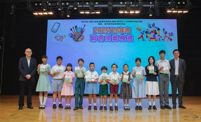 The Office for Film, Newspaper and Article Administration held the prize presentation ceremony for the "Healthy Student Video Contest 2026", the "'Control of Obscene and Indecent Articles Ordinance' Slogan and Colouring Competition 2025-26" and the "Healthy Mobile App Sticker Design Competition" today (July 4). Photo shows the guests with the winners of the "'Control of Obscene and Indecent Articles Ordinance' Slogan and Colouring Competition 2025-26". Source: HKSAR Government Press Releases