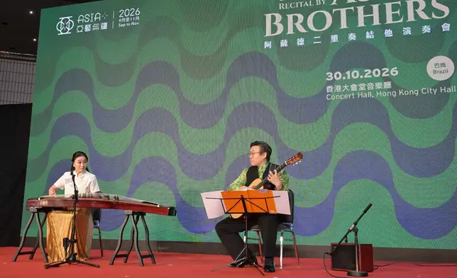 The fourth Asia+ Festival will be held from September to November. Photo shows renowned local guzheng virtuoso Wan Xing (left) performing at the programme briefing today (July 16). She will join the Assad Brothers in "Guitar Duo Recital by Assad Brothers" to play a piece inspired by legendary Chinese folk heroine Mulan. Source: HKSAR Government Press Releases