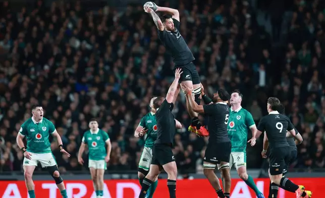 New Zealand's Josh Lord, top, gathers a high ball during their Nations Championship rugby international test match against Ireland in Auckland, New Zealand, Saturday, July 18, 2026. (Craig Butland/Photosport via AP)