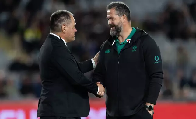 New Zealand All Blacks' head coach Dave Rennie, left, and Ireland coach Andy Farrell shake hands before their Nations Championship rugby international test match in Auckland, New Zealand, Saturday, July 18, 2026. (Brett Phibbs/Photosport via AP)
