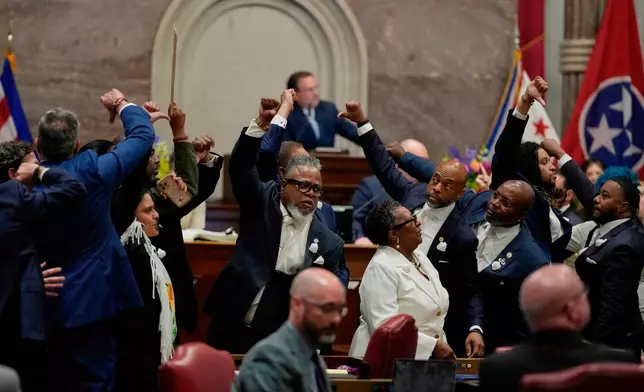 FILE - House Democrats gesture on the chamber floor as they vote against a bill to redraw U.S. Congressional voting maps during a special session of the state legislature, May 7, 2026, in Nashville, Tenn. (AP Photo/George Walker IV, File)