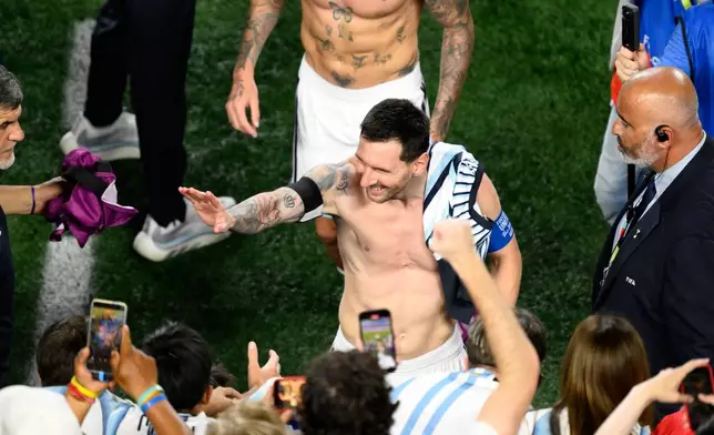 Argentina's Lionel Messi celebrates after defeating Switzerland in the World Cup quarterfinal soccer match in Kansas City, Mo., Saturday, July 11, 2026. (AP Photo/Reed Hoffmann)