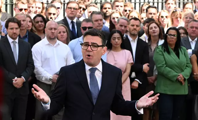 Britain's new Prime Minister Andy Burnham speaks to staff and media at 10 Downing Street in London, Monday, July 20, 2026.(AP Photo/Thomas Krych)
