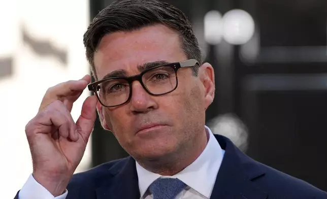 Britain's new Prime Minister Andy Burnham speaks to staff and media at 10 Downing Street in London, Monday, July 20, 2026.(AP Photo/Kirsty Wigglesworth)
