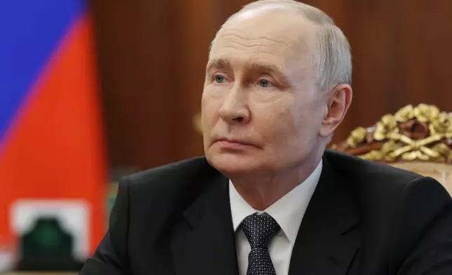 Russian President Vladimir Putin attends a meeting with Kaliningrad Region Governor Alexey Besprozvannykh in Moscow, Thursday, July 2, 2026. (Gavriil Grigorov, Sputnik, Kremlin Pool Photo via AP)
