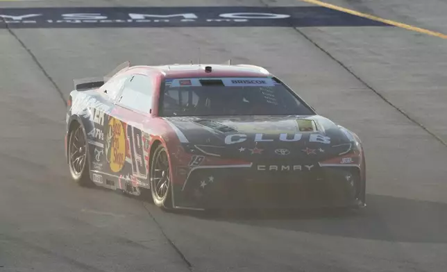 Chase Briscoe (19) drives to the track after making a pit stop during a NASCAR Cup Series auto race at Chicagoland Speedway in Joliet, Ill., Sunday, July 5, 2026. (AP Photo/Nam Y. Huh)