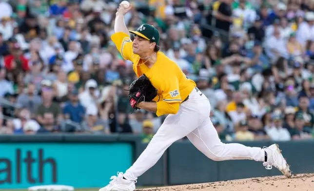 Athletics pitcher J.T. Ginn throws to the Washington Nationals during the second inning of a baseball game Saturday, July 18, 2026, in West Sacramento, Calif. (AP Photo/Sara Nevis)