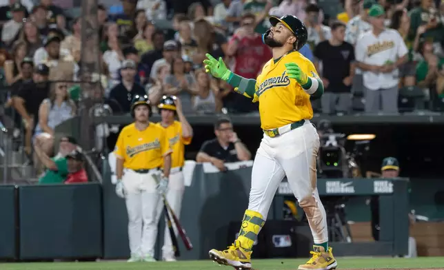 Athletics' Carlos Cortes runs the bases after hitting a home run during the seventh inning of a baseball game against the Washington Nationals, Saturday, July 18, 2026, in West Sacramento, Calif. (AP Photo/Sara Nevis)
