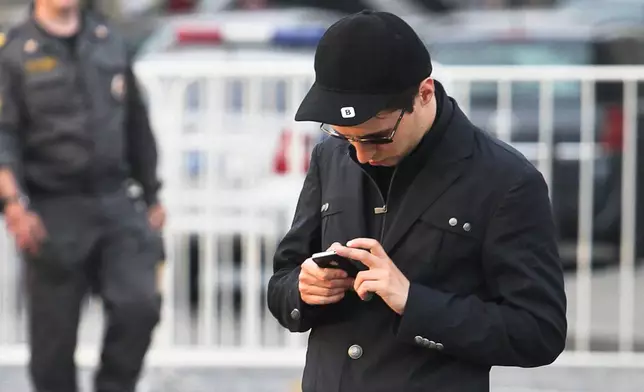 FILE - Pavel Durov, founder of Russia's leading social network site VKontakte, or "in contact", stands in Red Square in Moscow, Russia, on Saturday, May 19, 2012. (AP Photo/Roman Kulik, File)