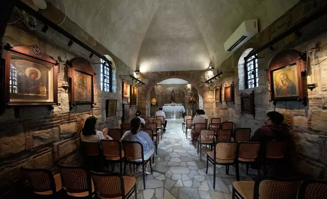 Visitors pray inside the Ephesus House, a replica of the House of the Virgin Mary in Ephesus, Turkey, at Alfonso town, Cavite province, Philippines on July 16, 2026. (AP Photo/Aaron Favila)