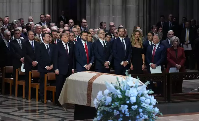 President Donald Trump, Vice President JD Vance and other guests, attend the funeral of Sen. Lindsey Graham, R-S.C., Tuesday July 28, 2026, at the Washington National Cathedral in Washington. (AP Photo/Jacquelyn Martin)