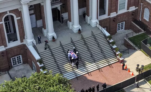 The casket of the late Sen. Lindsey Graham, R-S.C., is carried into First Baptist Church in Columbia, S.C., for a funeral service, Wednesday, July 29, 2026. (AP Photo/Gerald Herbert)