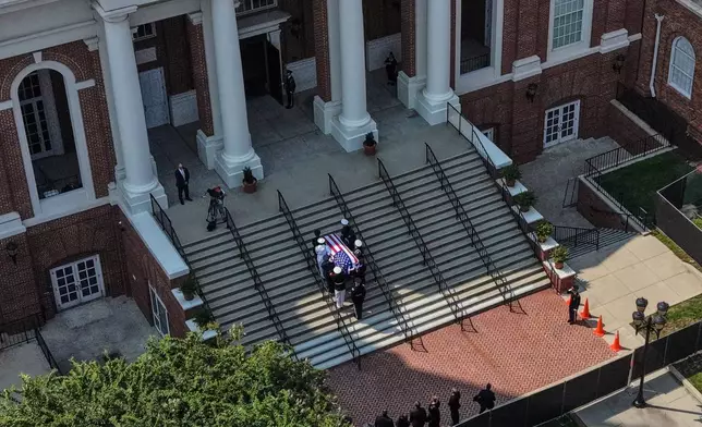 The casket of the late Sen. Lindsey Graham, R-S.C., is carried into First Baptist Church in Columbia, S.C., for a funeral service, Wednesday, July 29, 2026. (AP Photo/Gerald Herbert)