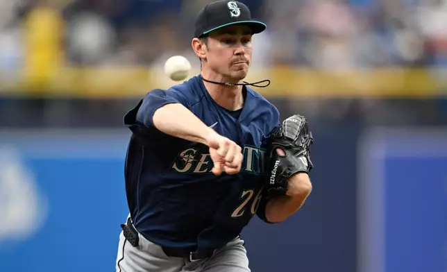 Seattle Mariners starting pitcher Emerson Hancock throws to home plate during the first inning of a baseball game against the Tampa Bay Rays, Sunday, July 12, 2026, in St. Petersburg, Fla. (AP Photo/Phelan M. Ebenhack)