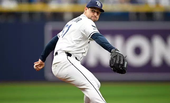 Tampa Bay Rays starting pitcher Ian Seymour throws to home plate during the first inning of a baseball game against the Seattle Mariners, Sunday, July 12, 2026, in St. Petersburg, Fla. (AP Photo/Phelan M. Ebenhack)