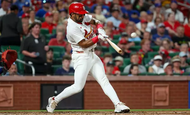 St. Louis Cardinals' José Fermín hits a solo home run during the second inning of a baseball game against the Chicago Cubs, Monday, July 27, 2026, in St. Louis. (AP Photo/Scott Kane)