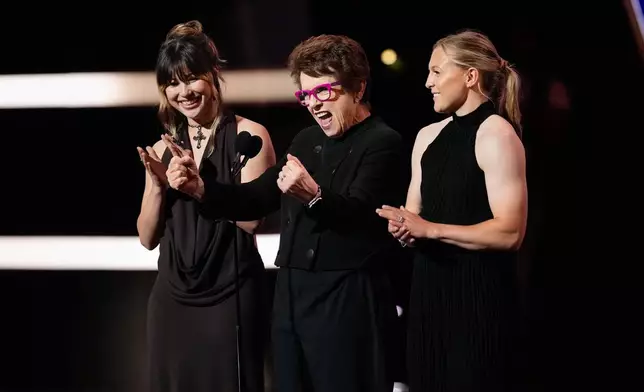 Alysa Liu, left, Billie Jean King, center, and Kendall Coyne Schofield present the Billie Jean King youth leadership award at the ESPY Awards in the David H. Koch Theater at Lincoln Center Wednesday, July 15, 2026, in New York. (AP Photo/Frank Franklin II)