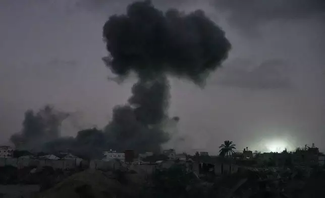 Smoke rises to the sky following an Israeli military strike in Maghazi refugee camp, in the central Gaza Strip, Wednesday, July 15, 2026. (AP Photo/Abdel Kareem Hana)