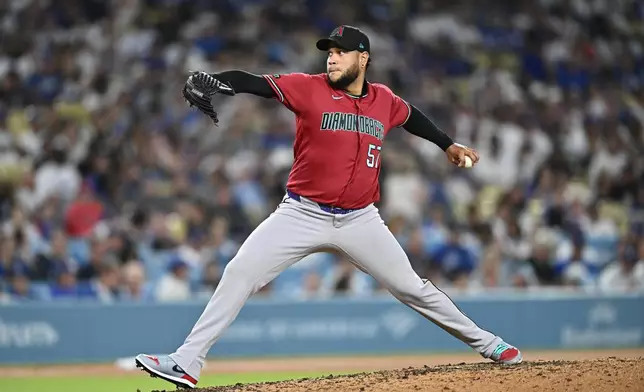 Arizona Diamondbacks pitcher Eduardo Rodriguez delivers during the fourth inning of a baseball game against the Los Angeles Dodgers, Friday, July 10, 2026, in Los Angeles. (AP Photo/William Liang)