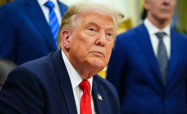 President Donald Trump speaks about Dulles International Airport modernization, in the Oval Office of the White House, Wednesday, July 29, 2026, in Washington. (AP Photo/Julia Demaree Nikhinson)