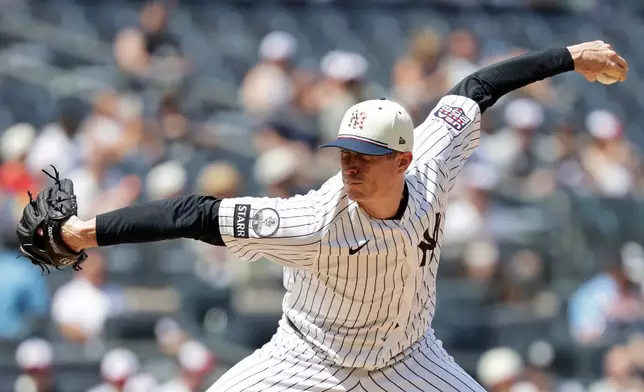 New York Yankees pitcher Tim Hill (41) delivers during the fourth inning of a baseball game against the Minnesota Twins, Saturday, July 4, 2026, in New York. (AP Photo/Adam Hunger)